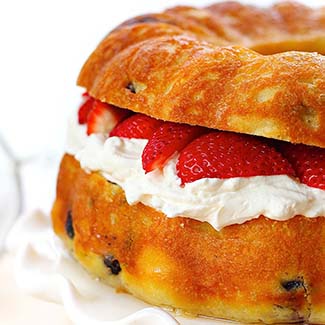 Baba Au Rhum with Strawberries and Whipped Cream