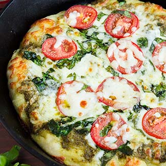 Skillet Pizza with Pesto Tomatoes and Spinach - Red Star® Yeast