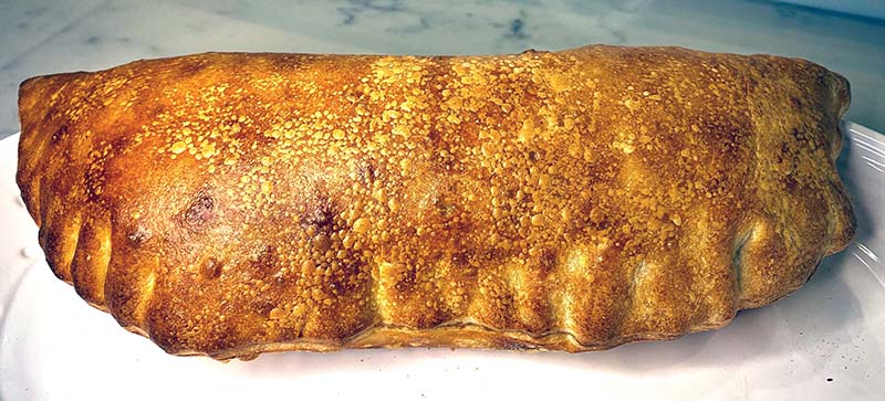 New York Style Calzones | Make calzones or stromboli with this easy New York-style pizza dough. Perfect for dinner or a late night snack. Pizzaioli Leo Spizzirri shows you how to make it with a step-by-step video.